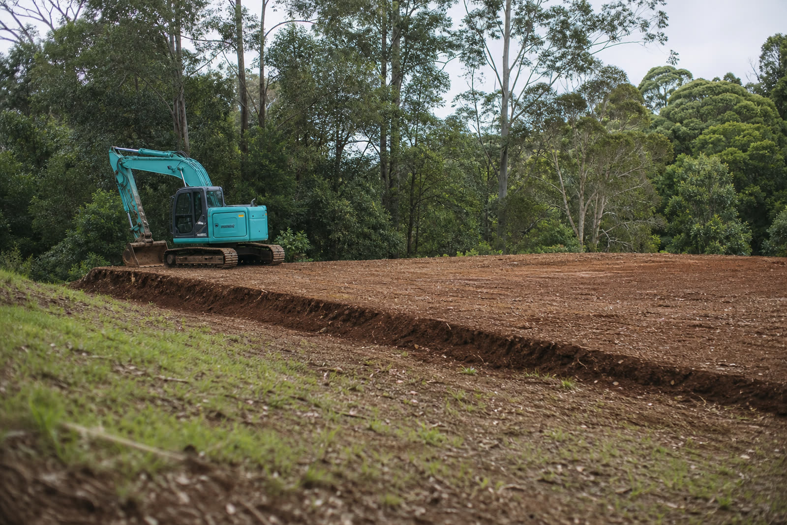 A cleared and graded building pad